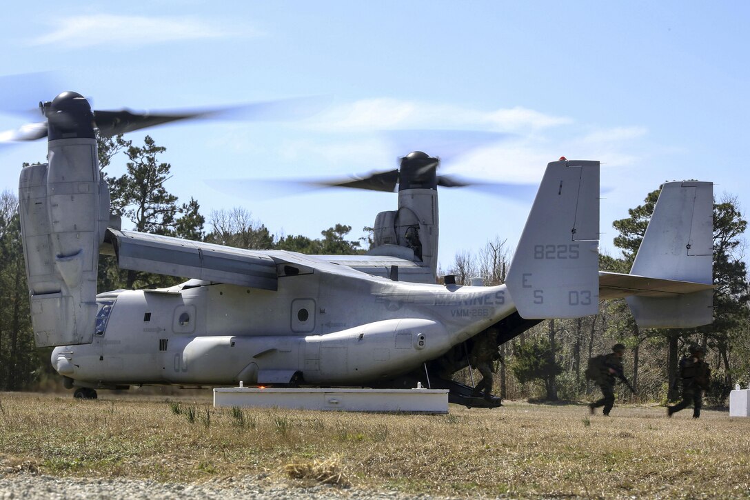 Marines exit an MV-22B Osprey during a field exercise on Camp Lejeune, N.C., March 10, 2016. Marine Corps photo by Cpl. Paul S. Martinez