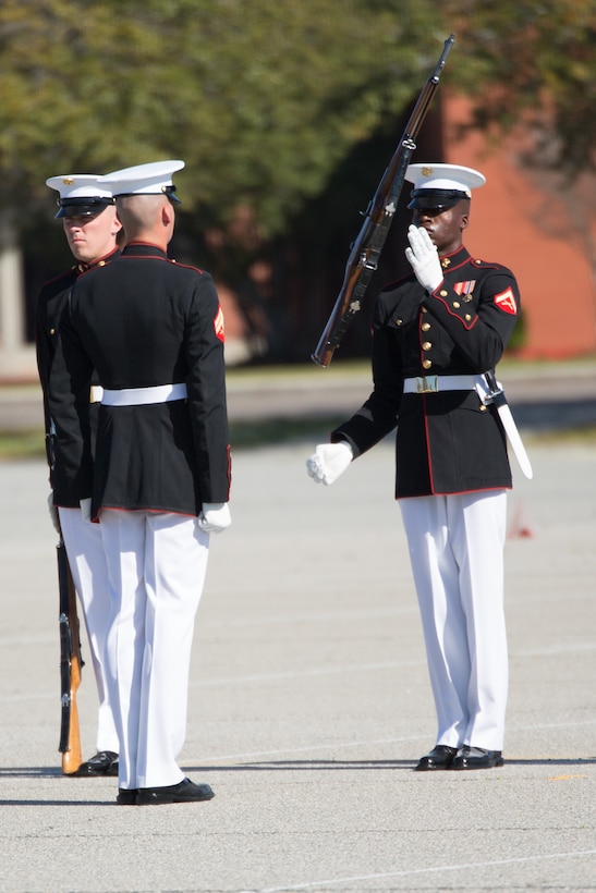 Marines of the Silent Drill Platoon perform a precision drill movement with M1 Garand rifles at Parris Island, S.C., Mar. 15, 2016. The platoon, assigned to the Battle Color Detachment based at Marine Barracks Washington, D.C., executed nearly 15 minutes of unique drill movements without verbal commands in front of recruits, Marines and civilians. The performance was part of the detachment’s 2016 spring tour. (Photos by Pfc. Carlin Warren)