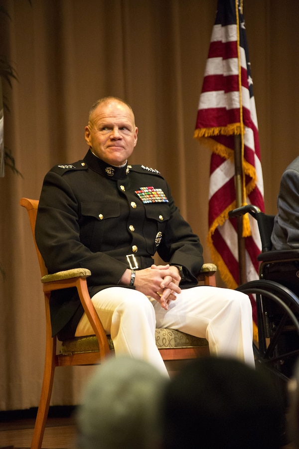 Commandant of the Marine Corps Gen. Robert B. Neller attends an award ceremony at Tallahassee, Fla., March 18, 2016. Neller presented retired U.S. Marine Lt. Gen. Lawrence F. Snowden, an Iwo Jima veteran, with the Department of Defense Medal for Distinguished Public Service and Navy Distinguished Public Service Award. (U.S. Marine Corps photo by Staff Sgt. Gabriela Garcia/Released)