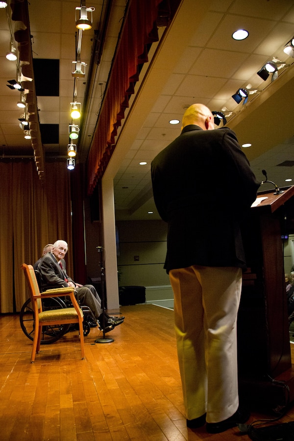 Retired U.S. Marine Lt. Gen. Lawrence F. Snowden, left, an Iwo Jima veteran, listens to Commandant of the Marine Corps Gen. Robert B. Neller during his award ceremony at Tallahassee, Fla., March 18, 2016. Neller presented Snowden with the Department of Defense Medal for Distinguished Public Service and Navy Distinguished Public Service Award. (U.S. Marine Corps photo by Staff Sgt. Gabriela Garcia/Released)