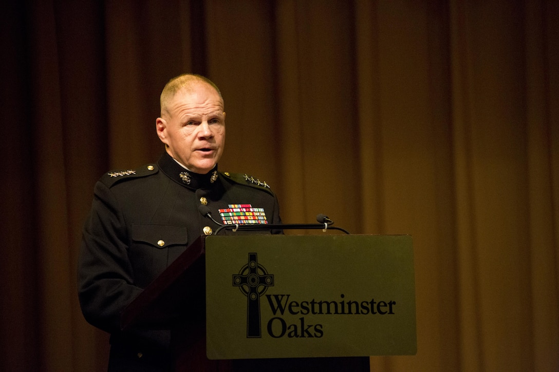 Commandant of the Marine Corps Gen. Robert B. Neller speaks during an award ceremony at Tallahassee, Fla., March 18, 2016. Neller presented retired U.S. Marine Lt. Gen. Lawrence F. Snowden, an Iwo Jima veteran, with the Department of Defense Medal for Distinguished Public Service and Navy Distinguished Public Service Award. (U.S. Marine Corps photo by Staff Sgt. Gabriela Garcia/Released)