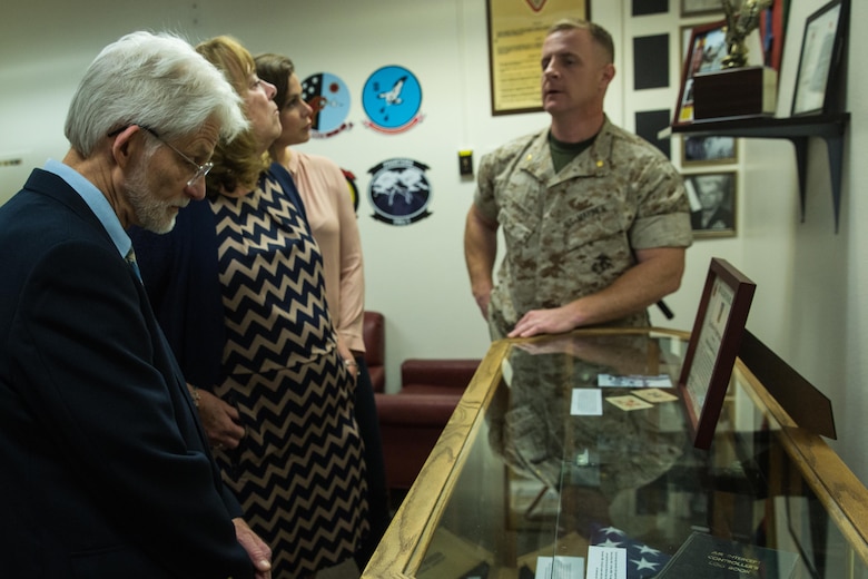 Maj. Mark Murphy, an air command and control officer with MACG-38, speaks to three family members of Staff Sgt. Jacob Murphy, a Marine who was killed in action during World War II, aboard Marine Corps Air Station Miramar, Calif., March 16. Staff Sgt. Jacob Marty served with Air Warning Squadron (AWS) 1, a unit that was affiliated with MACG-38, and was the first Marine killed in action who was associated with the unit. (U.S. Marine Corps photo by Sgt. Lillian Stephens/Released)