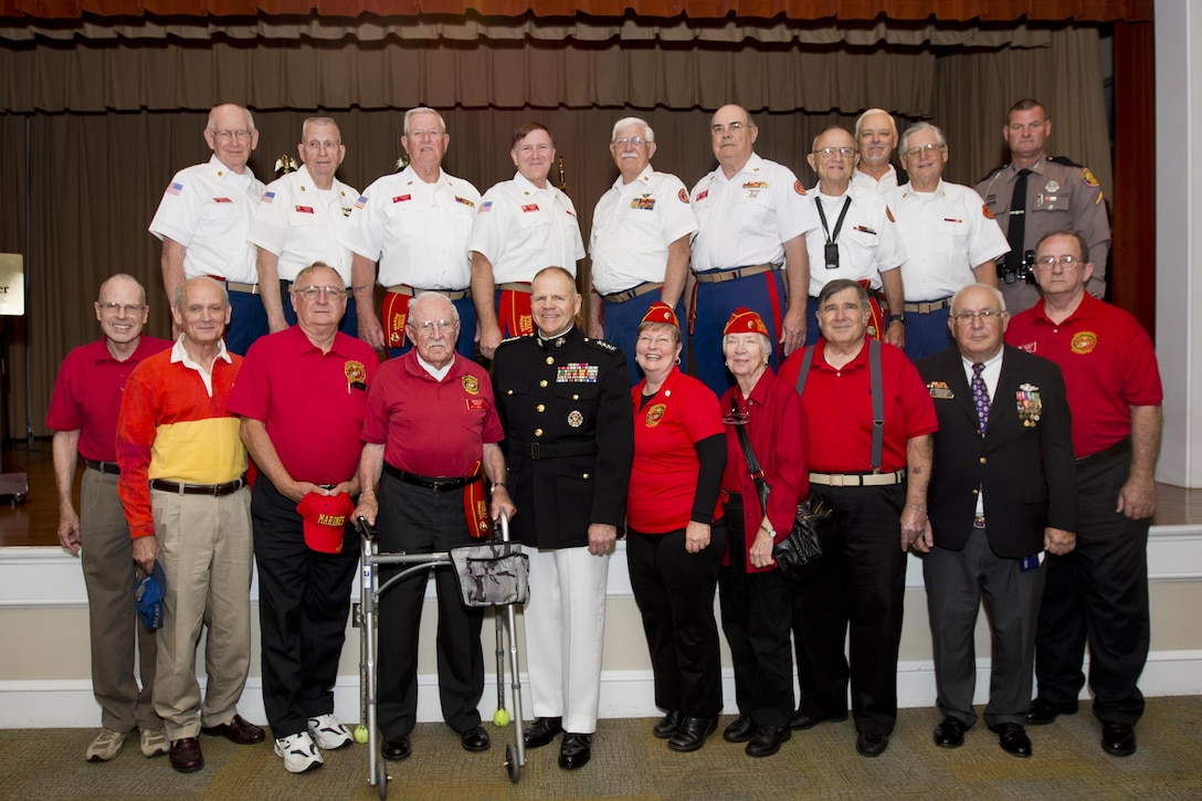 Commandant of the Marine Corps Gen. Robert B. Neller poses with members of the Marine Corps League after an award ceremony at Tallahassee, Fla., March 18, 2016. Neller presented retired U.S. Marine Lt. Gen. Lawrence F. Snowden, an Iwo Jima veteran, with the Department of Defense Medal for Distinguished Public Service and Navy Distinguished Public Service Award. (U.S. Marine Corps photo by Staff Sgt. Gabriela Garcia/Released)