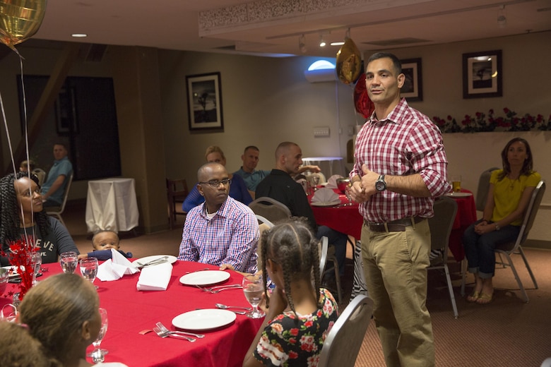 Lt. Col. Speros C. Koumparakis, commanding officer, Communication Training Battalion, Marine Corps Communication-Electronics School, talks about the battalion’s accomplishments over the last year during its first birthday celebration at the Officer’s Club March 10, 2016. The battalion, activated March 12, 2015, brought the training of enlisted and commissioned communication Marines under one command. (Official Marine Corps photo by Lance Cpl. Levi Schultz/Released)