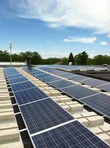 A 20-kilowatt array of solar panels fitted to Building 36 on Camp Grayling. The solar panel array is one of many green energy initiatives the Michigan Army National Guard is employing to generate renewable energy, reduce pollution and save taxpayers money by reducing energy costs for everyday operations. It is one of many initiatives throughout the National Guard.