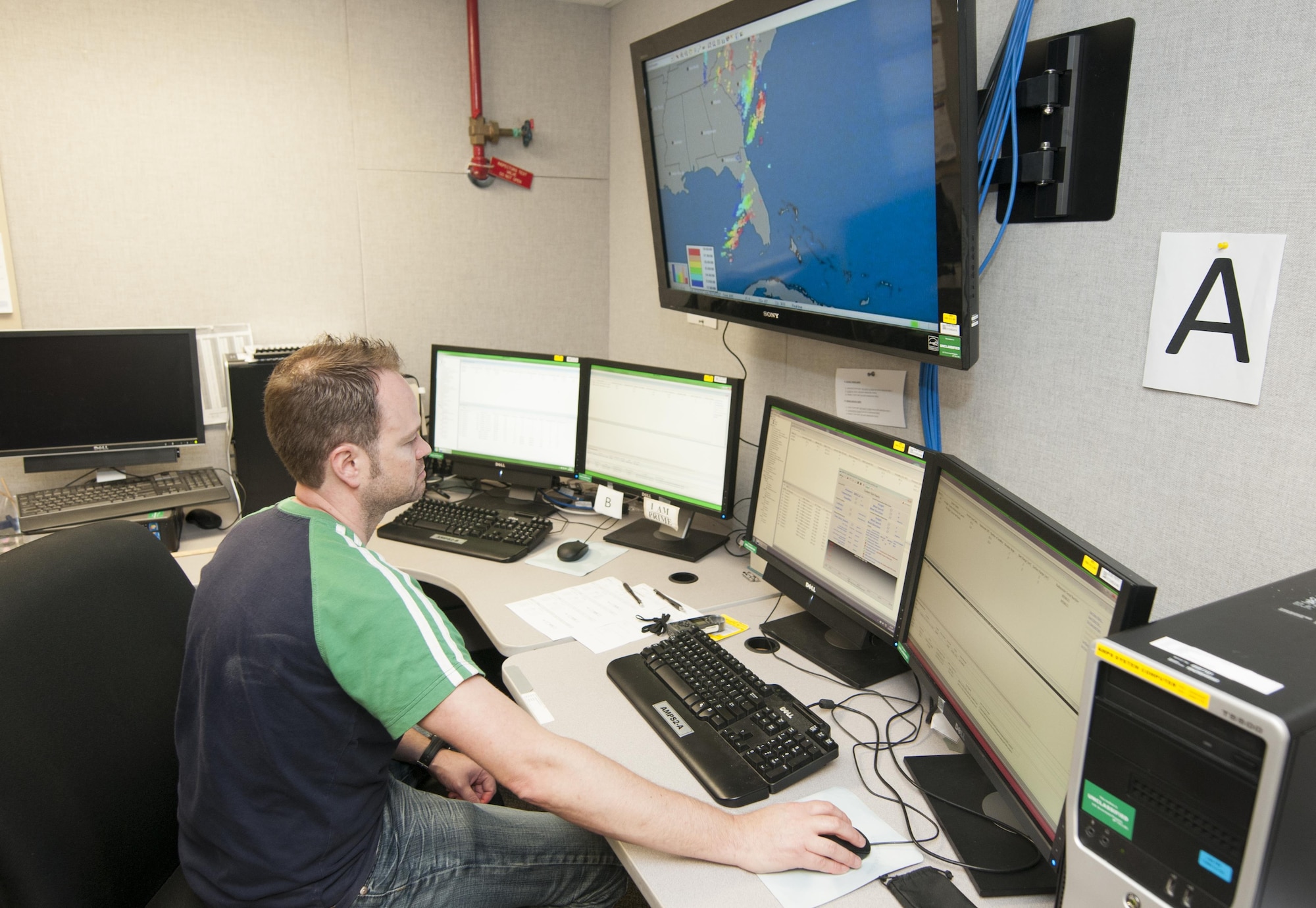 Mike Boyer, a meteorological data specialist, tracks weather data gathered by a weather balloon released from Cape Canaveral Air Force Station, Fla., Feb. 24, 2016. Data from the balloons, particularly wind speed and direction, help Airmen and mission partners decide either to launch or postpone a space mission. (U.S. Air Force photo/Sean Kimmons)