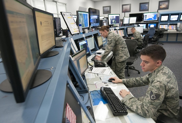 Staff Sgts. Brad Owens and Stephanie Cole, and Senior Airman Henry Lero, all range weather forecasters with the 45th Weather Squadron, collect data ahead of an upcoming space launch from Cape Canaveral Air Force Station, Fla., Feb. 24, 2016. The squadron uses more than $80 million worth of equipment to analyze weather patterns in the 500-square-mile area. (U.S. Air Force photo/Sean Kimmons)