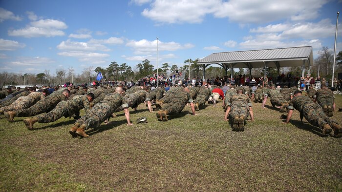The Marine Raider Memorial March closing ceremony concluded with a “25 and 5” push up event at Stone Bay at Marine Corps Base Camp Lejeune, N.C., March 21, 2016. The Marine Raider Memorial March was designed to honor the seven Marine Raiders who died on March 10, 2015 and their families, as well as bring awareness to their sacrifice.