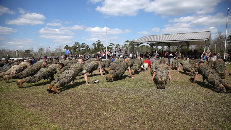 The Marine Raider Memorial March closing ceremony concluded with a “25 and 5” push up event at Stone Bay at Marine Corps Base Camp Lejeune, N.C., March 21, 2016. The Marine Raider Memorial March was designed to honor the seven Marine Raiders who died on March 10, 2015 and their families, as well as bring awareness to their sacrifice.