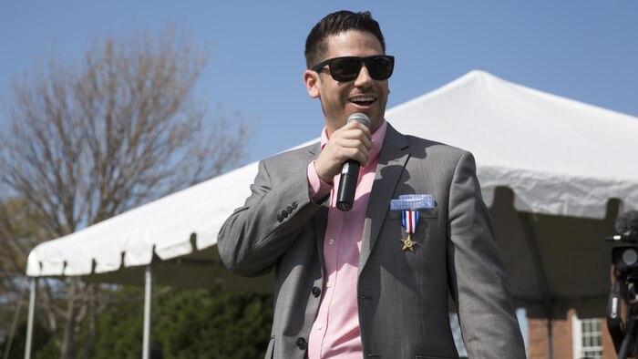 Sgt. Matthew Parker (ret.) speaks to a group of 3rd Battalion, 2nd Marine Regiment Marines during his Silver Star ceremony at Marine Corps Base Camp Lejeune, North Carolina, March 18, 2016. Parker was awarded the Silver Star for his courageous actions during Operation Enduring Freedom in 2011, where assumed control of his platoon during a firefight after several leaders had been injured. 