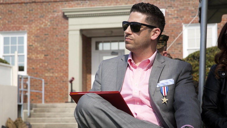 Sgt. Matthew Parker (ret.) wears a Silver Star Medal presented to him at Marine Corps Base Camp Lejeune, North Carolina, March 18, 2016. Parker was awarded the Silver Star for his courageous actions during Operation Enduring Freedom in 2011, where he assumed control of his platoon during a firefight after several leaders had been injured.