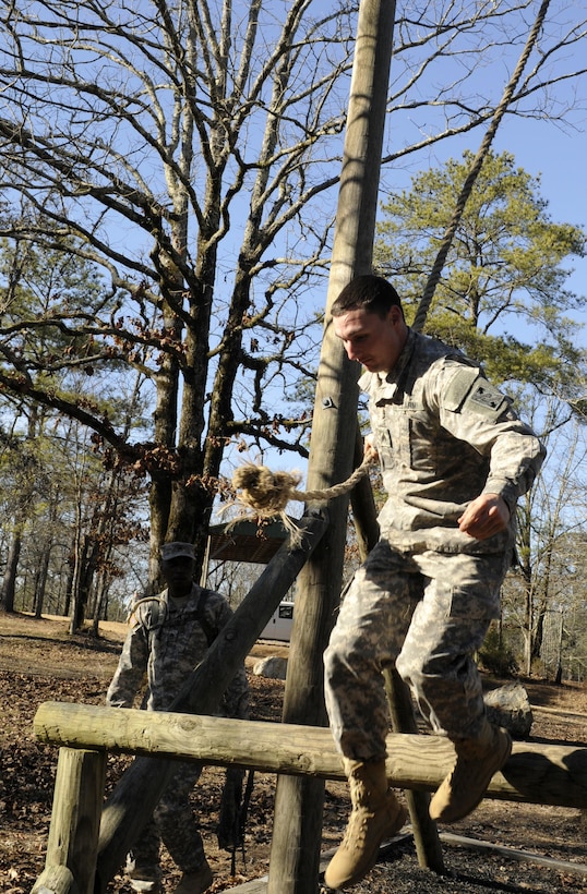 U.S. Army Sgt. Kevin E. Graney of Pemberton, N.J., lead mechanic for the 352nd Combat Sustainment Support Battalion, fires on the pistol qualification course as part of the 642nd Regional Support Group's Best Warrior Competition at Fort McClellan, Ala., Feb. 18. (U.S. Army photo by Sgt. 1st Class Gary A. Witte, 642nd Regional Support Group)