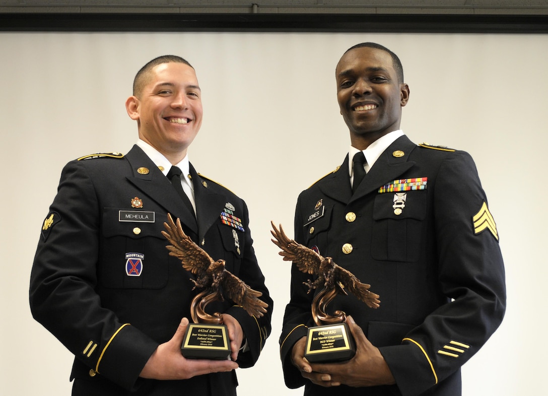 The winners of the 642nd Regional Support Group's Best Warrior Competition at Fort McClellan, Ala. At right, U.S. Army Sgt. Wayne Jones of Gainesville, Ga., a team leader with the 461st Human Resources Company, was named top NCO of the contest during a short ceremony Saturday, Feb. 20. Likewise, U.S. Army Spc. Kyle K. Meheula of Kalihi, Hawaii, a mechanic with the 642nd Regional Support Group, earned the top enlisted award. The four-day competition tested the Reserve Soldiers' military skills, bearing, knowledge and physical fitness through a variety of tasks and events.