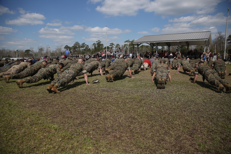 The Marine Raider Memorial March closing ceremony concluded with a “25 and 5” push up event at Stone Bay aboard Marine Corps Base Camp Lejeune, N.C., March 21, 2016. The Marine Raider Memorial March was designed to honor the seven Marine Raiders who died on March 10th, 2015 and their families, as well as bring awareness to their sacrifice. 