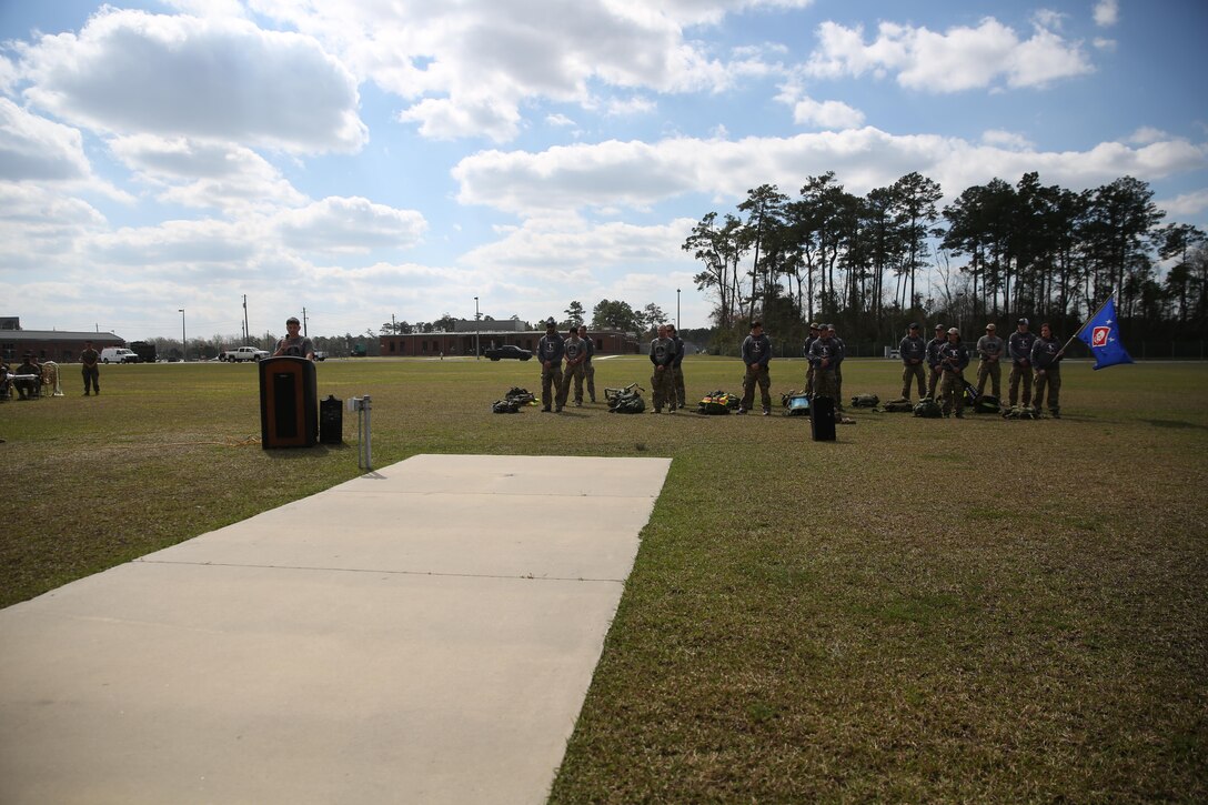 Staff Sgt. Nathan Harris, an instructor at Marine Special Operations School, spoke at the conclusion of the Marine Raider Memorial March. The Marine Raider Memorial March was designed to honor the seven Marine Raiders who died on March 10th, 2015 and their families, as well as bring awareness to their sacrifice. There was a short ceremony to honor the fallen at Stone Bay aboard Marine Corps Base Camp Lejeune, N.C., March 21, 2016. 