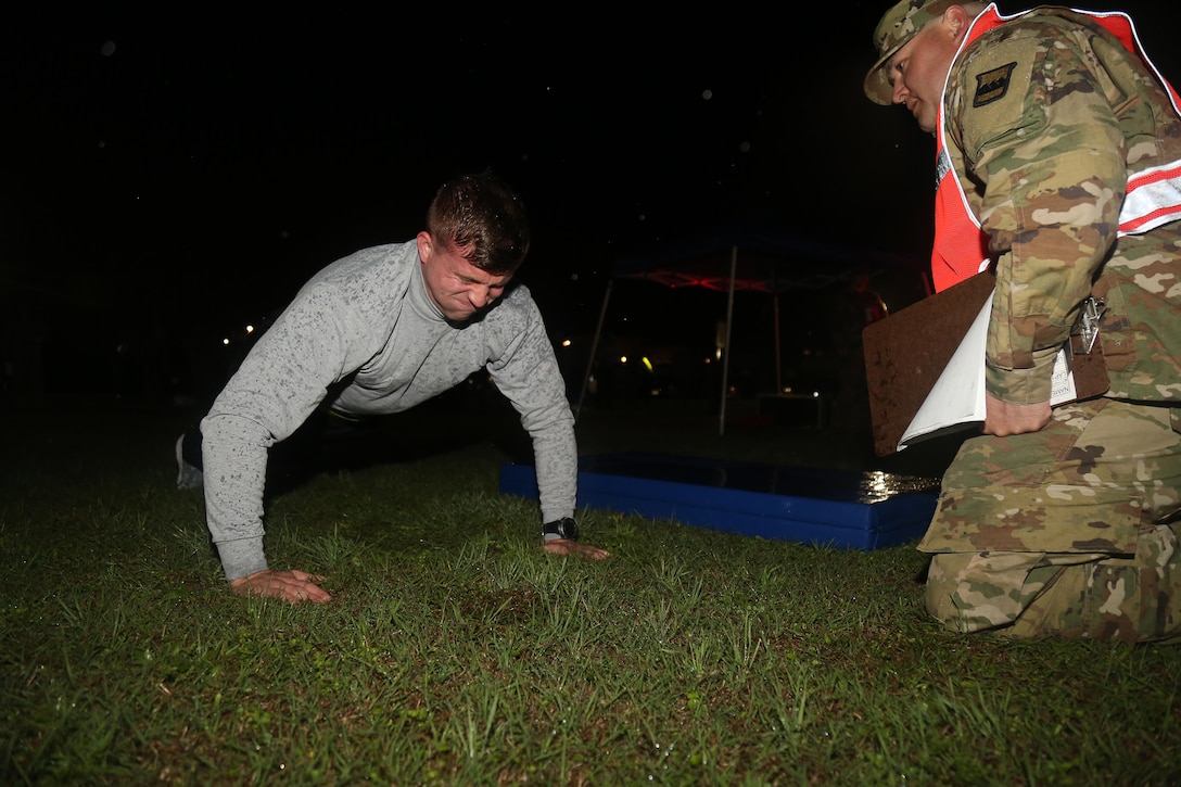 U.S. Army Sgt. Jacob Pulliman of the 379th Battalion from Arkansas performs push-ups for the Army Physical Fitness Test during the Best Warrior Competition (BWC) at Camp Bullis, Texas, March 10, 2016. The BWC is an annual competition to identify the strongest and most well-rounded Soldiers through the accomplishment of physical and mental challenges, as well as basic Soldier skills. (U.S. Army photo by Spc. Darnell Torres)