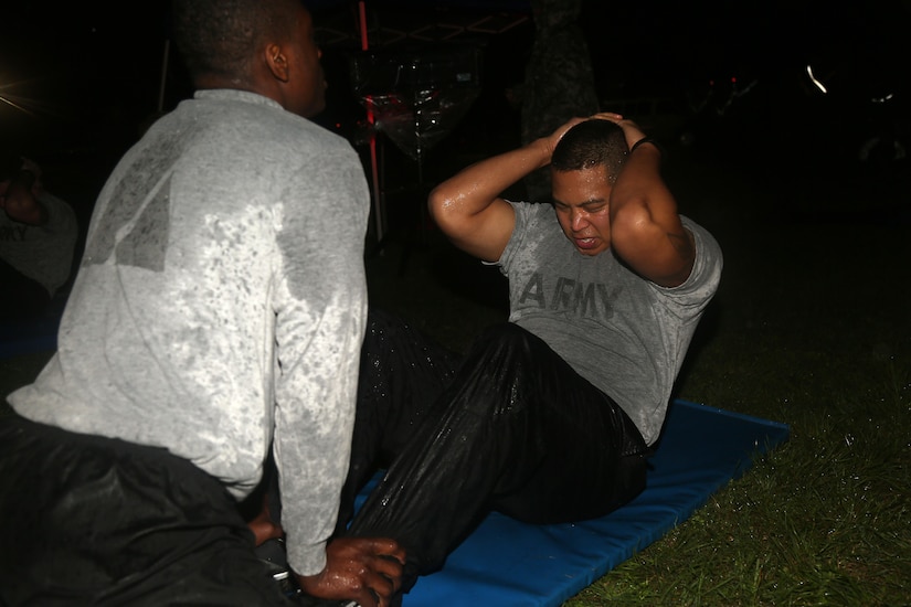 U.S. Army Staff Sgt. Julises Abdon of the 5/80th Ordnance Battalion performs the situp for the Army Physical Fitness Test event during the Best Warrior Competition (BWC) at Camp Bullis, Texas, March 10, 2016. The BWC is an annual competition to identify the strongest and most well-rounded Soldiers through the accomplishment of physical and mental challenges, as well as basic Soldier skills. (U.S. Army photo by Spc. Darnell Torres)