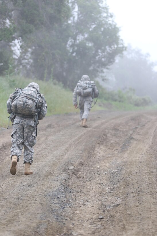 Nicknamed "The Microwave," by Marines, Soldiers compete in a 10-kilometer ruck march with a 35-pound pack through the hills, Camp Pendleton, Calif., March 19, 2016, as part of the Best Warrior Competition hosted by the 311th Sustainment Command (Expeditionary). 6,400 Army Reserve Soldiers from throughout Arizona, California, and Nevada are part of the 311th ESC which provides deployed logistics command, control, and operational sustainment support. The top  Soldier and Noncommisioned Officer will advance to compete at the 79th Sustainmen Support Command BWC in April. (U.S. Army photo by Spc. Timothy Yao/Released)