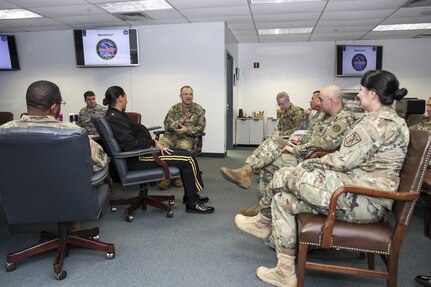 Maj. Gen. Brian Harris (Center), commanding general of Joint Task Force 51 from U.S. Army North (Fifth Army), leads a group discussion with with senior military leaders from Maryland-based commands about ways to support Defense Support of Civil Authorities (DSCA) events during a planning meeting at a military facility in Reisterstown, Maryland, March 13. Among those present were Maj. Gen. Phillip Churn, commanding general for the 200th Military Police Command, Col. Irene Zoppi, deputy commander of the 200th MP Cmd., and Maj. Gen. Linda Singh, adjutant general of Maryland. Some key topics discussed were state-by-state capabilities, command post, identification of DSCA units and funding for DSCA training.  (U.S. Army photo by Maj. Levar Armstrong)