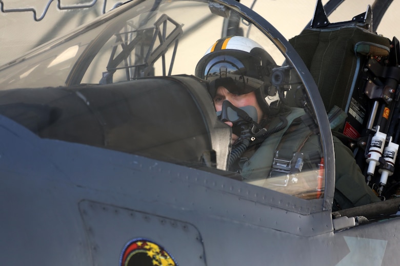 A pilot inspects his instruments prior to take off at Marine Corps Air Station Cherry Point, N.C., March 11, 2016. Pilots hold a close relationship with the plane captains who guide them onto the flight line after a final inspection. A plane captain is responsible for conducting a final examination of the aircraft and guiding the pilots out to the runway. Plane captains possess extensive knowledge of their designated aircrafts and can determine if there are any last minute descrapensies that can potentially ground the aircraft. (U.S. Marine Corps photo by Cpl. N.W. Huertas/Released)
