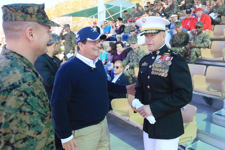 Lieutenant Col. Jared Spurlock, executive officer, 7th Marine Regiment introduces Van Tanner, member, Palm Desert City Council, to Maj. Gen. Lewis A. Craparotta, Combat Center Commanding General, during the Battle Color Ceremony, part of the Palm Desert City Council, Palm Desert Chamber of Commerce and the 1st Marine Division Association, Desert Cities Mitchell Paige Medal of Honor Chapter base tour hosted by 7th Marine Regiment March 9, 2016. (Official Marine Corps photo by Cpl. Julio McGraw/Released)