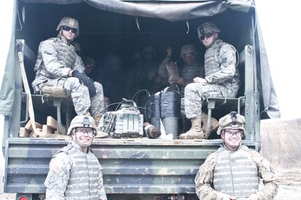 Carpooling - U.S. Army Reserve Soldiers with the 450th Engineer Company load up to place demolitions during the 478th Engineer Battalion's crew-served weapons qualification and field training exercise, March 10 to 13 at Fort Knox, Ky. (U.S. Army photo by Staff Sgt. Debralee Best)