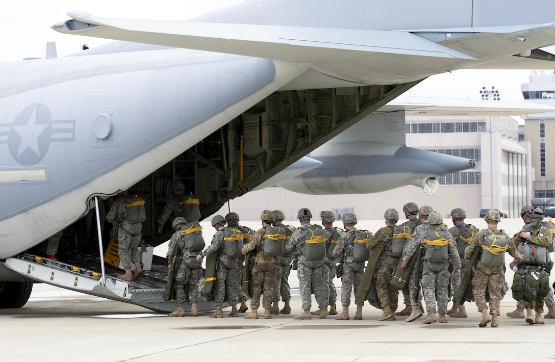 Soldiers with the U.S. Army Reserve’s, 412th Civil Affairs Battalion, Columbus, Ohio, file onto a U.S. Marine Corps KC-130J aircraft from the 252 Marine Aerial Refueler Transport Squadron, Marine Aircraft Group 14, 2nd Marine Aerial Wing, Marine Corps Air Station, Cherry Point, North Carolina, to conduct a jump over Wright-Patterson Air Force Base, Ohio, March 19, 2016. Several units from around Wright-Patterson AFB provided support to the jump. (U.S. Air Force photo by Wesley Farnsworth/Released)