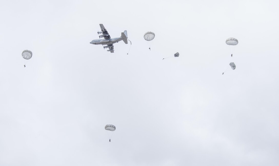 Members of the U.S. Army Reserve’s 412th Civil Affairs Battalion, Columbus, Ohio, jump from a KC-130J aircraft from the 252 Marine Aerial Refueler Transport Squadron, Marine Aircraft Group 14, 2nd Marine Aerial Wing, Marine Corps Air Station, Cherry Point, N.C., over Wright-Patterson Air Force Base, Ohio, March 19, 2016.  When deployed, the unit conducts civil affairs operations in support of Central Command’s theater and task force commanders. Soldiers of the 412th Civil Affairs Battalion have been on the front lines of operations in Iraq, Afghanistan and in the Horn of Africa. (U.S. Air Force photo by Wesley Farnsworth/Released)