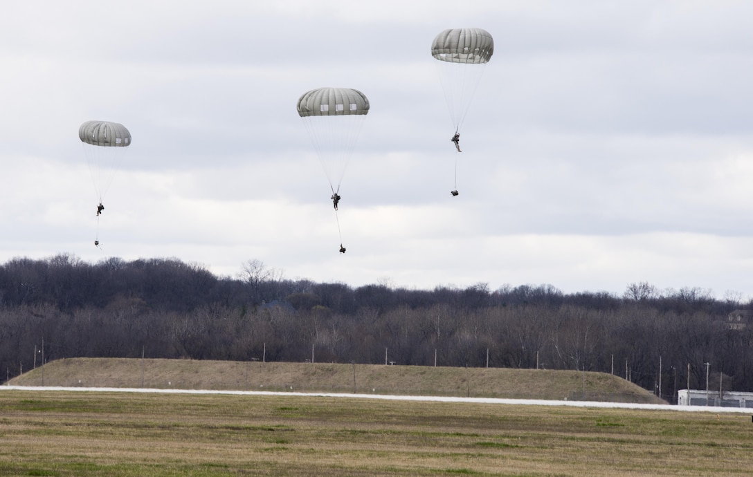 Members of the U.S. Army Reserve’s 412th Civil Affairs Battalion, Columbus, Ohio, jump from 1250 feet from a KC-130J aircraft from the 252 Marine Aerial Refueler Transport Squadron, Marine Aircraft Group 14, 2nd Marine Aerial Wing, Marine Corps Air Station, Cherry Point, N.C., over Wright-Patterson Air Force Base, Ohio, March 19, 2016. When deployed, the unit conducts civil affairs operations in support of Central Command’s theater and task force commanders. Soldiers of the 412th Civil Affairs Battalion have been on the front lines of operations in Iraq, Afghanistan and in the Horn of Africa. (U.S. Air Force photo by Wesley Farnsworth/Released)