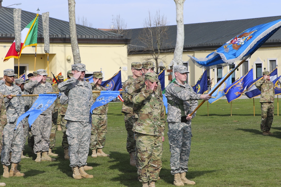 Military Intelligence Soldiers from the 307th Military Intelligence Battalion participate in the activation ceremony of 207th Military Intelligence Brigade March 16, 2016, here at Hoekstra Field at Caserma Ederle. The 207th MI Bde. will serve as the Theater Intelligence Brigade for U.S. Africa Command and is under operational control of U.S. Army Africa. The brigade includes the 207th MI Bde. Headquarters and 307th MI Battalion located here, as well as the 522nd MI Battalion located at Wiesbaden, Germany and the 337th MI Battalion located at Fort Sheridan, Ill. (U.S. Army Africa photo by Staff Sgt. Lance Pounds)