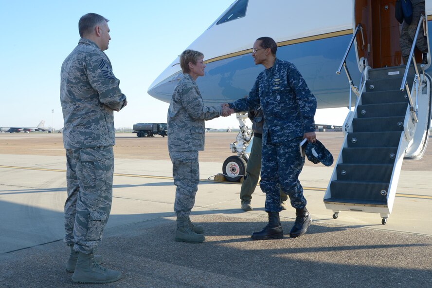 U.S. Navy Adm. Cecil D. Haney, U.S. Strategic Command (USSTRATCOM) commander (right), is greeted by U.S. Air Force Col. Kristin Goodwin, 2nd Bomb Wing commander (center), and U.S. Air Force Chief Master Sgt. Tommy Mazzone, 2nd Bomb Wing command chief master sergeant, at Barksdale Air Force Base, La., March 21, 2016. While there, Haney and Mr. W. Gary Gates, Strategic Command Consultation (SCC) Committee member (not pictured), presented the 2015 Omaha Trophy, strategic bomber category, to Goodwin and Mazzone in recognition of the 2nd Bomb Wing's contributions to USSTRATCOM's global strategic missions. The Omaha Trophy, which dates back to the U.S. Air Force's Strategic Air Command, was originally created by the SCC in 1971. At the time, a single trophy was presented annually as a token of appreciation to USSTRATCOM's best wing. Since then, the tradition has evolved to unit-level awards that recognize the command's premier intercontinental ballistic missile (ICBM) wing, ballistic missile submarine, strategic bomber wing and global operations (space/cyberspace) unit. This year, a new category was added to include the combatant command's top strategic aircraft wing. (U.S. Air Force photo by Staff Sgt. Joseph A. Pagan Jr.) 