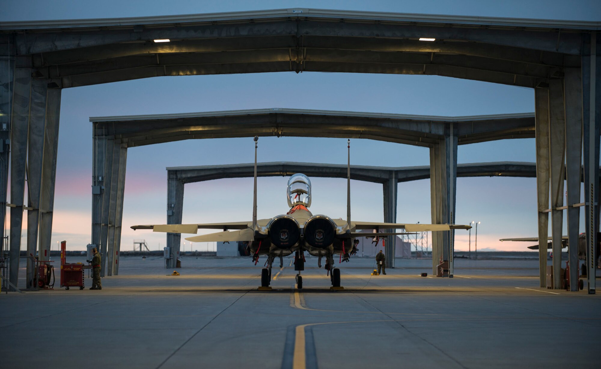 An F-15E Strike Eagle sits under a sunshade at Mountain Home Air Force Base, Idaho, March 15, 2016. Due to an array of avionics and electronic systems, the F-15E has the capability to fight at low altitudes, day or night and in most weather conditions. (U.S. Air Force photo by Senior Airman Malissa Lott/RELEASED)