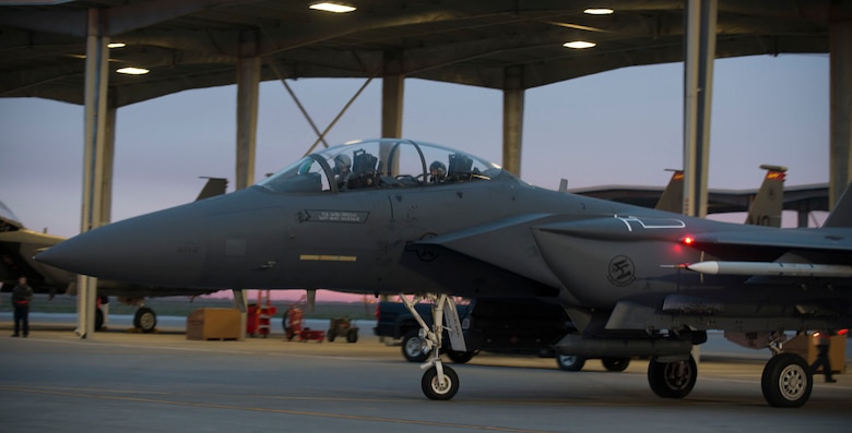 An F-15E Strike Eagle taxi to a runway at Mountain Home Air Force Base, Idaho, March 15, 2016. Airmen from the 366 Operations Group and the 366th Maintenance Group participated in sortie surge, a 72-hour readiness exercise. (U.S. Air Force photo by Senior Airman Malissa Lott/ RELEASED)