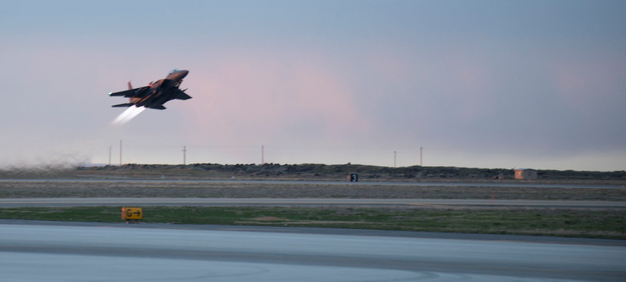 An F-15E Strike Eagle takes off at Mountain Home Air Force Base, Idaho, March 15, 2016. The first flight of the F-15E was made in July 1972. (U.S. Air Force photo by Senior Airman Malissa Lott/ RELEASED)