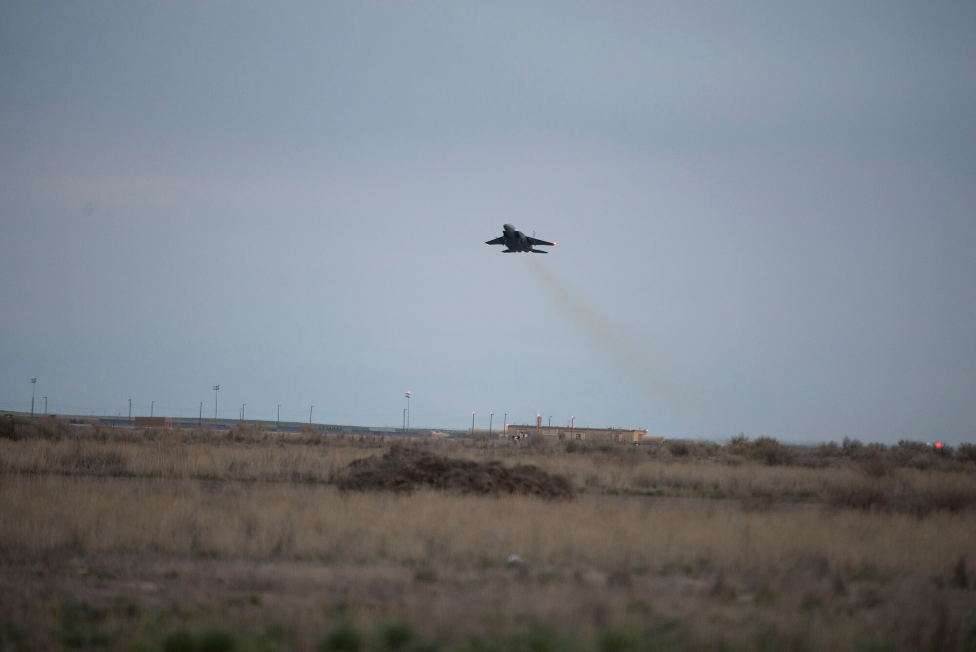 An F-15E Strike Eagle takes off from Mountain Home Air Force Base, Idaho, March 16, 2016. The 366th Fighter Wing conducted a sortie suge which prepared Gunfighters for the stress of 24-hour operations. (U.S. Air Force photo by Airman 1st Class Chester Mientkiewicz/Released)