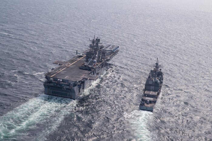 160316-N-TH560-384 EAST SEA (March 16, 2016) Forward-deployed amphibious assault ship USS Bonhomme Richard (LHD 6) conducts fueling operations with guided-missile cruiser USS Shiloh (CG 67).  Bonhomme Richard is the flagship of the Bonhomme Richard Expeditionary Strike Group and is participating in Exercise Ssang Yong 2016. SY16 is a biennial combined amphibious exercise conducted by forward-deployed forces with the Republic of Korea Navy and Marine Corps, Australian Army and Royal New Zealand Army Forces in order to strengthen interoperability and working relationships across a wide range of military operations from disaster relief to complex expeditionary operations.  (U.S. Navy photo by Mass Communication Specialist 3rd Class Jeanette Mullinax/Released)