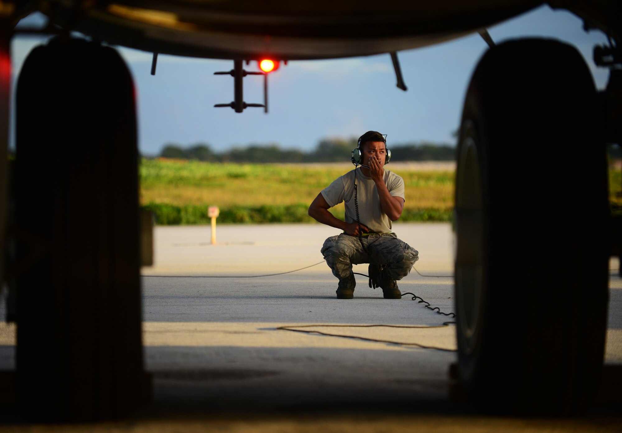 Senior Airman Joeyfel Abayon, 36th Expeditionary Aircraft Maintenance Squadron crew chief, performs a pre-flight inspection on a B-52 Stratofortress March 21, 2016, at Andersen Air Force Base, Guam. The U.S. Pacific Command has maintained a rotational strategic bomber presence in the Indo-Asia-Pacific region for more than a decade. (U.S. Air Force photo by Senior Airman Joshua Smoot/Released)