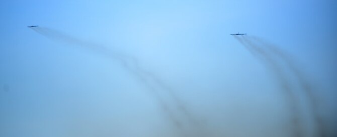 Two B-52 Stratofortresses take off March 21, 2016 at Andersen Air Force Base, Guam. The U.S. conducts continuous bomber presence operations as part of a routine, forward deployed, global strike capability supporting regional security and our allies in the Indo-Asia-Pacific region. (U.S. Air Force photo by Senior Airman Joshua Smoot/Released)