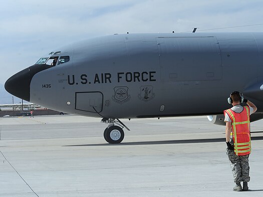 Senior Airman Dakota Trujillo, 151st Aircraft Maintenance Squadron crew chief, renders a salute as a KC-135 Stratotanker departs for take-off, March 4, 2016, at Nellis Air Force Base, Nev. Crews from Fairchild AFB, Wash.; McConnell AFB, Kan.; and Roland R. Wright ANG Base, Utah; were tasked to maintain the tanker task force during Red Flag 16-2. (U.S. Air Force photo/Senior Airman David Bernal Del Agua)
