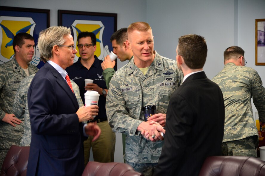 Team Dover Honorary Commanders take a tour of the Wing Staff Agency March 10, 2016, at Dover Air Force Base, Del. The Honorary Commanders toured the base Chapel, legal office, safety office, command post, and received a mission brief from Col. Michael Grismer, 436th Airlift Wing commander. (U.S. Air Force Photo/Senior Airman William Johnson)