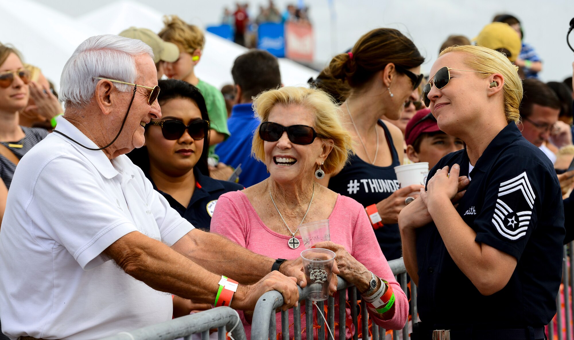 Chief Master Sgt. Candace Smith, the chief enlisted manager of the U.S. Air Force Thunderbirds, receives a compliment from a patron during Tampa Bay AirFest 2016 at MacDill Air Force Base, March 20, 2016. AirFest offers the public an opportunity to meet the men and women of the armed forces and see military equipment through the efforts of active duty, guard and reserve service members, as well as civilian employees, retirees and family members. (U.S. Air Force photo by Staff Sgt. Melanie Hutto)