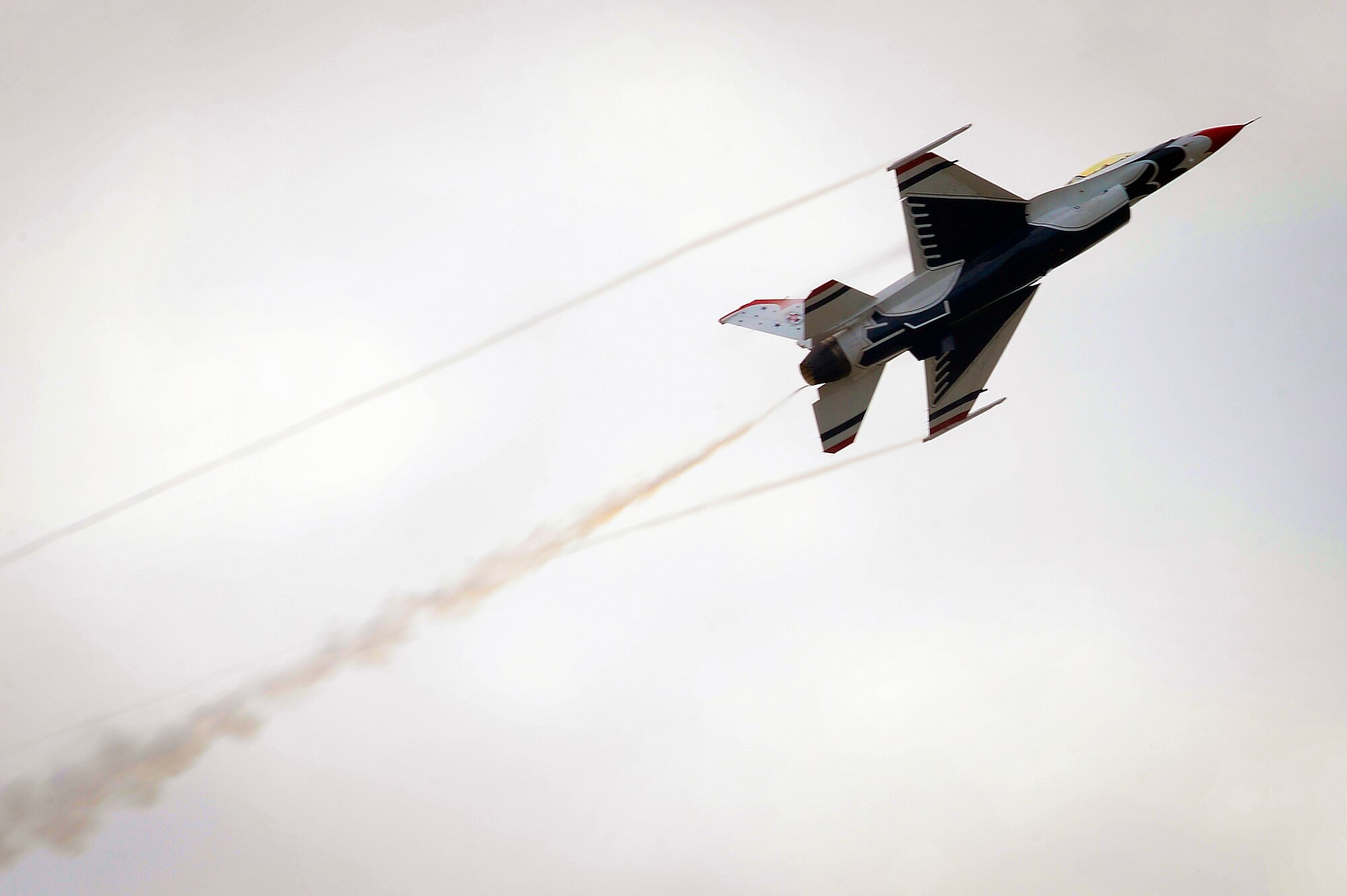 U.S. Air Force Thunderbird Number 6 performs an aerial demonstration during Tampa Bay AirFest 2016 at MacDill Air Force Base, Fla., March 20, 2016. As the opposing solo, Maj. Alex Turner had to wow the crowd on his own in Thunderbird Number 5’s absence. (U.S. Air Force photo by Senior Airman Ned T. Johnston)