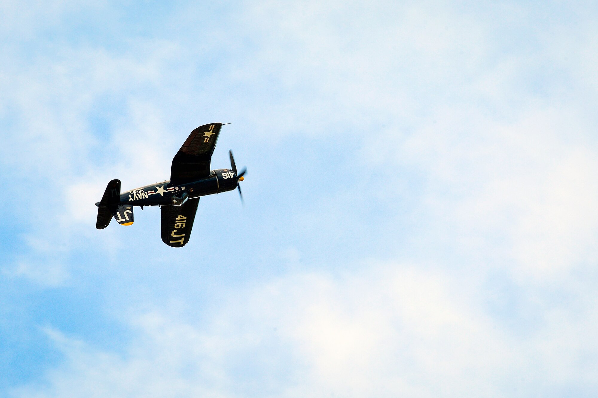 Jim Tobul performs an aerial demonstration in an F4U-F Corsair during Tampa Bay AirFest 2016 at MacDill Air Force Base, Fla., March 20, 2016. Tobul’s demonstration was a tribute to the men and machines that fought to defend democracy and freedom in the Korean Conflict from 1950 - 1953. (U.S. Air Force photo by Senior Airman Ned T. Johnston)