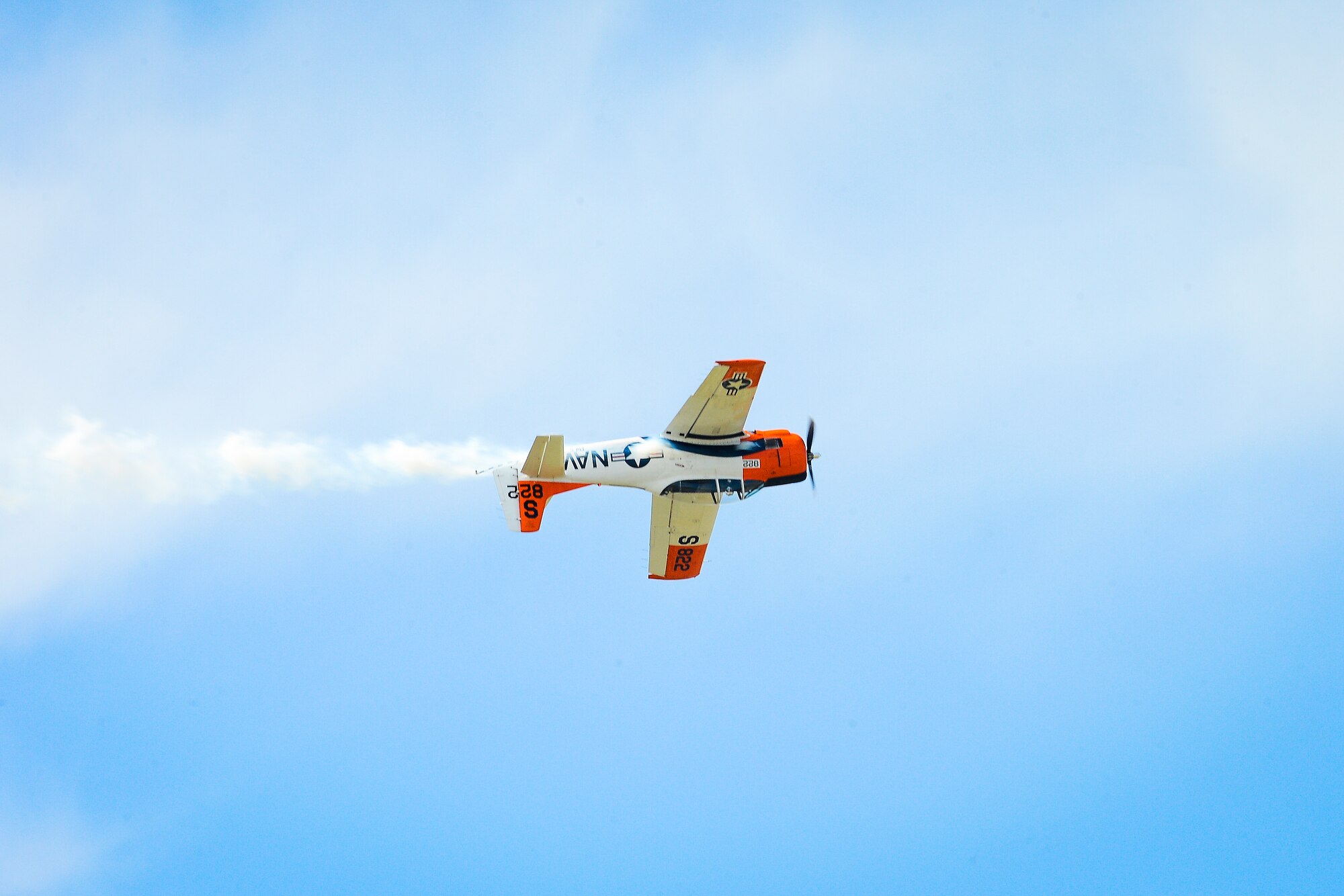 Jerry “Jive” Kerby maneuvers through the sky in a T-28 Trojan during Tampa Bay AirFest 2016 at MacDill Air Force Base, Fla., March 20, 2016. The T-28 Trojan is a military trainer aircraft used by the Air Force and Navy in the 1950’s and was also used as a counter-insurgency aircraft, primarily during the Vietnam War. (U.S. Air Force photo by Senior Airman Ned T. Johnston)