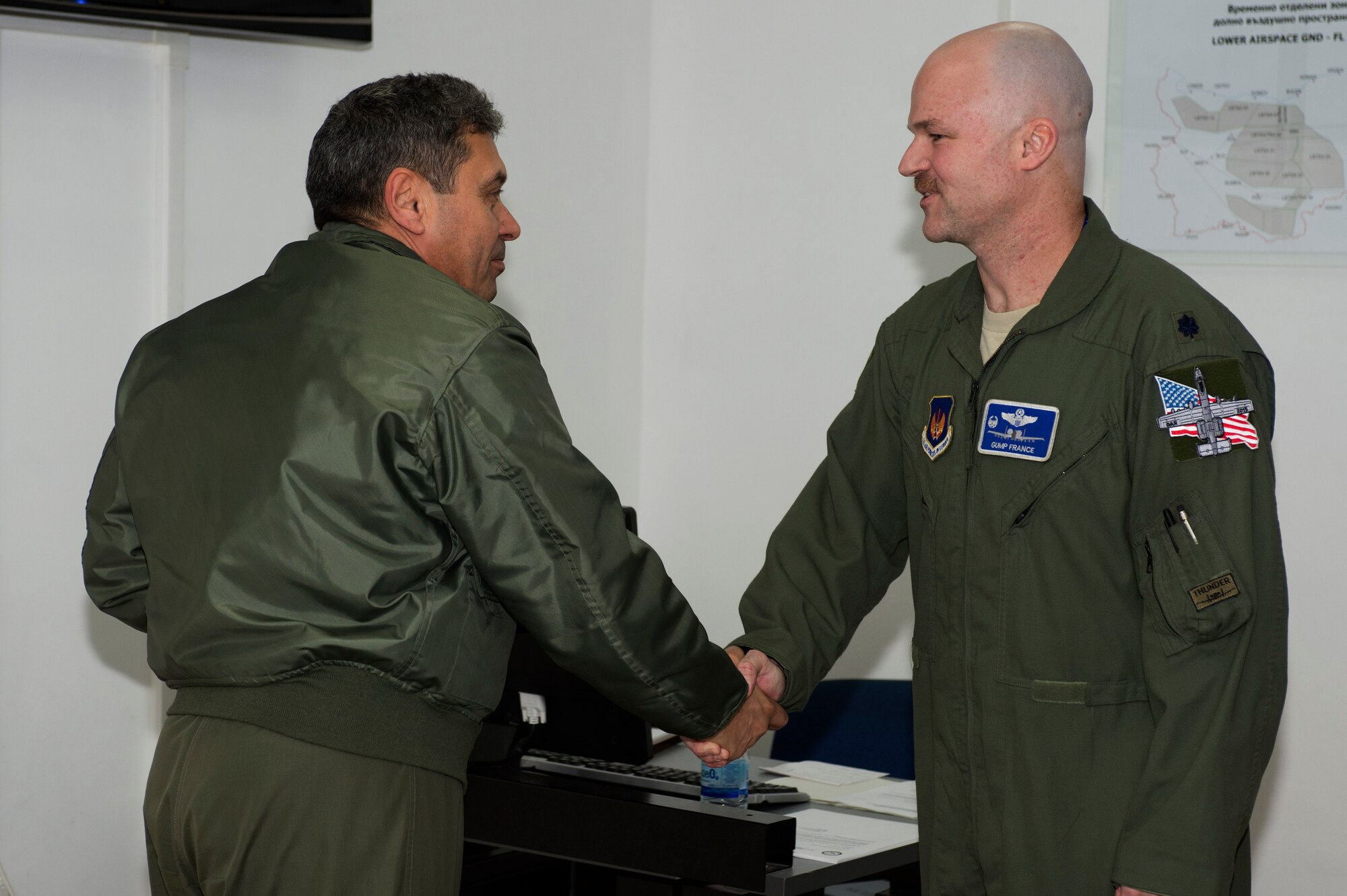 Bulgarian air force Brig. Gen. Ivan Lalov, 3rd Air Force Base commander, left, shakes the hand of U.S. Air Force Lt. Col. Bryan France, 74th Expeditionary Fighter Squadron commander, right, during the 74th EFS’s deployment in support of Operation Atlantic Resolve at Graf Ignatievo, Bulgaria, March 16, 2016. The 74th EFS participated in a six-month deployment to Eastern Europe which began at Amari Air Base, Estonia, and concluded at Graf Ignatievo. (U.S. Air Force photo by Staff Sgt. Joe W. McFadden/Released)