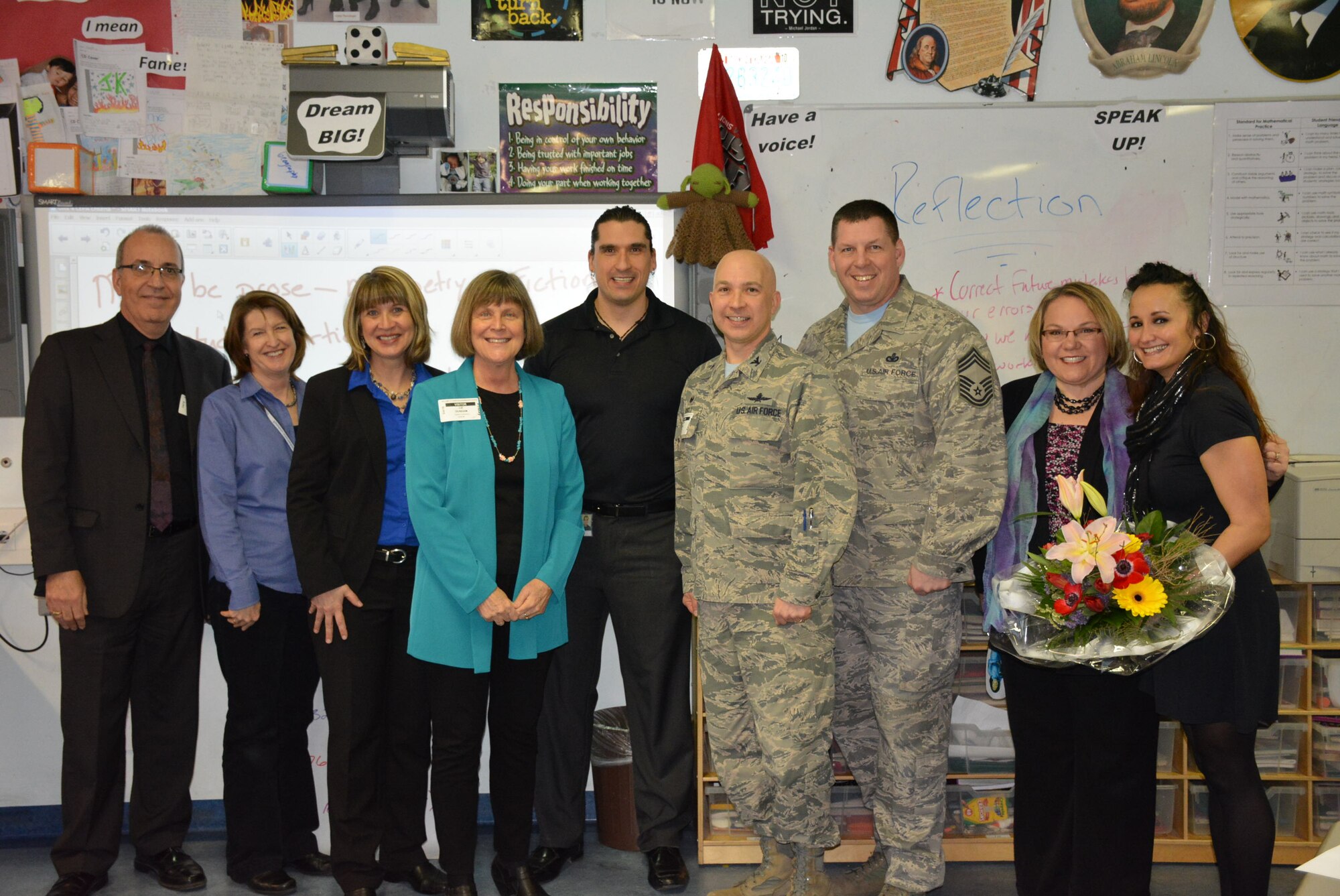 Richard Dysinger, Ramstein Intermediate School teacher, was recently named the Kaiserslautern Teacher of the Year. Liz Dunham, Department of Defense Education Activity-Kaiserslautern superintendent, Col. Curtis Juell, 86th Mission Support Group commander, and Mary Salerno, Ramstein Intermediate School principal, presented the award to Dysinger.  Dysinger is currently a fifth-grade instructor at Ramstein Intermediate School in Kaiserslautern, Germany. Previously, he spent two years supporting the military community in Heidelberg at Patrick Henry Elementary School and five years as a classroom teacher and educational technologist at Matthew C. Perry Elementary School in Iwakuni, Japan.  Dysinger will now move on to the next level and compete for Department of Defense Education Activity Teacher of the Year. (Courtesy photo)