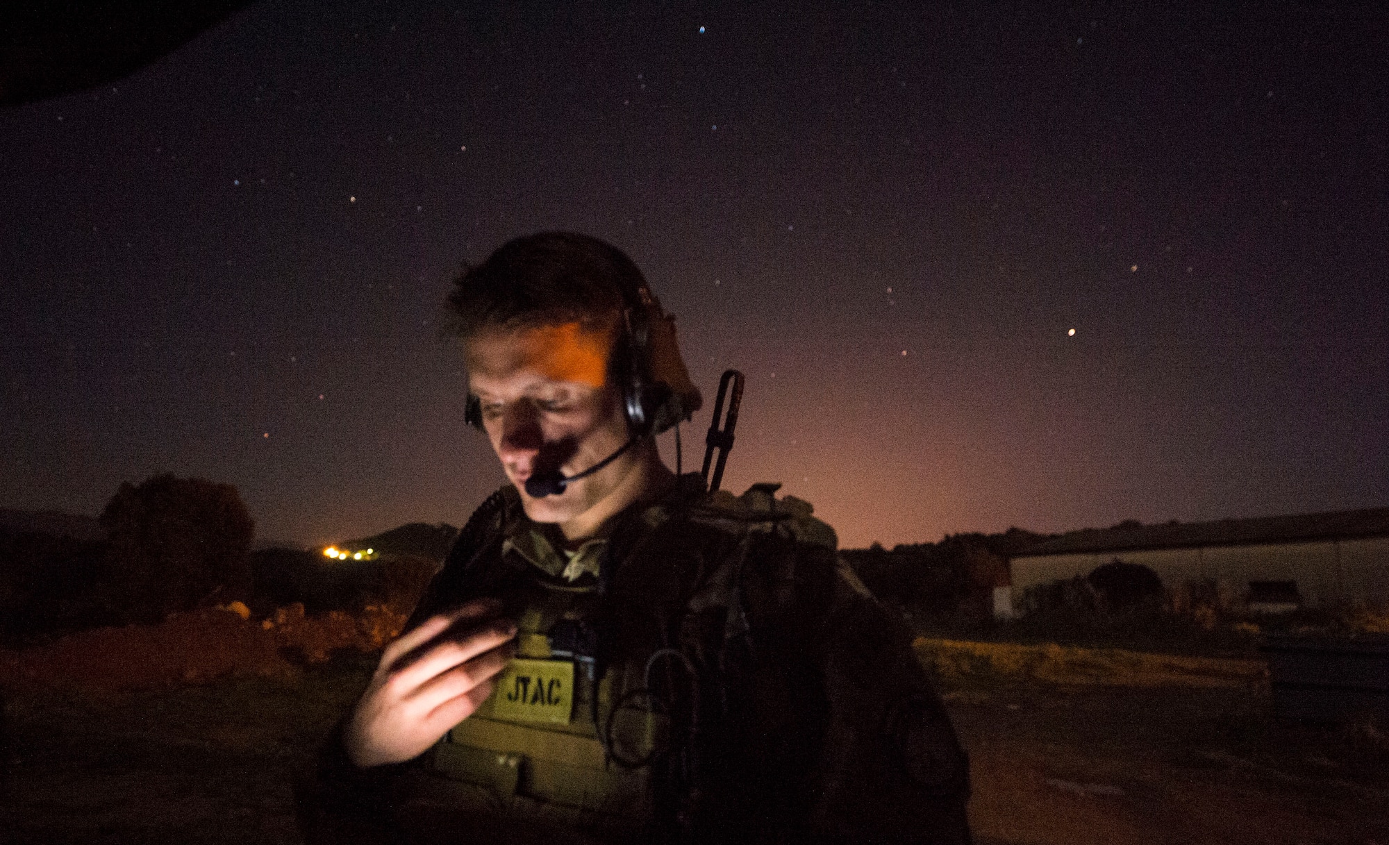 Senior Airman Tormod Lillekroken, 2nd Air Support Operations Squadron joint terminal attack controller, reviews training objectives as part of a night training scenario during Exercise Serpentex ‘16 in Corsica, France, March 15, 2016. Lillekroken recently reached his goal to be qualified as a joint terminal attack controller. Lillekroken has been in the tactical air control party career field for more than four years. (U.S. Air Force photo/Staff Sgt. Sara Keller)
