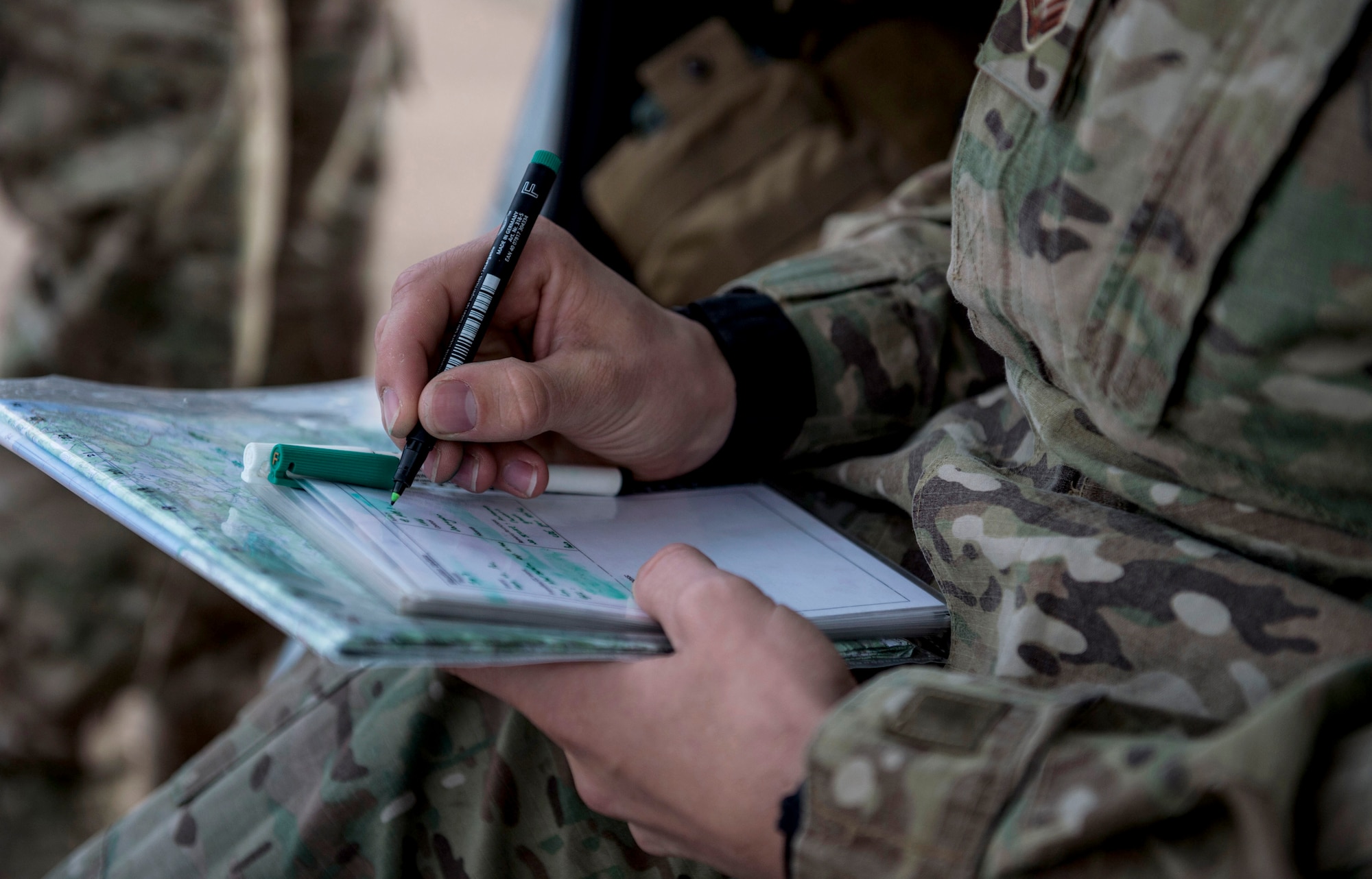 Senior Airman Tormod Lillekroken, 2nd Air Support Operations Squadron joint terminal attack controller, prepares for a training scenario during Exercise Serpentex ‘16 in Corsica, France, March 15, 2016. Serpentex ‘16 is an annual French-led exercise that is designed to enhance NATO operations and training between allies and partners. Multiple NATO countries worked together throughout the exercise in order to better learn each other’s capabilities and improve in areas that fellow JTACs would be able to help. (U.S. Air Force photo/Staff Sgt. Sara Keller)