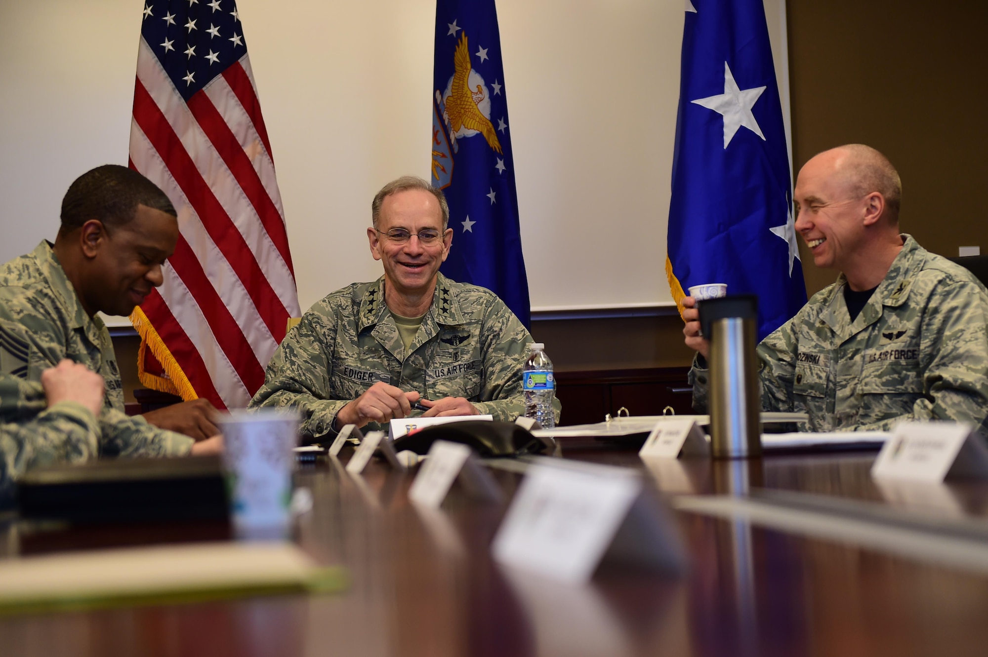 Lt. Gen. (Dr.) Mark A. Ediger, Surgeon General of the Air Force, Col. Joseph Chozinski, Command Surgeon of Air Force Space Command, and Chief Master Sgt. Tracy Washington, 779th Medical Group superintendent, discuss Buckley medical facilities March 18, 2016, during a briefing on Buckley Air Force Base, Colo. Topics of discussion covered progression on the new dental clinic and future on-base medical capabilities. (U.S. Air Force photo by Airman 1st Class Gabrielle Spradling/Released)