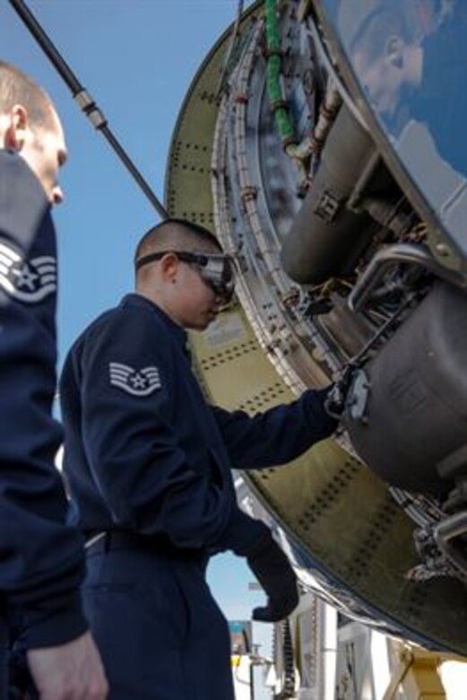 Staff Sgt. Lawrence Lin, a 89th Maintenance Group flying crew chief, inspects engine compartments of an 89th Airlift Wing C-32A Executive Transport at Travis Air Force Base, Calif., Sept. 14, 2015. As an FCC, Lin is responsible for on- and off-station maintenance of 1st Airlift Squadron C-40B Clipper and C-32A aircraft. (U.S. Air Force photo/Senior Master Sgt. Kevin Wallace)